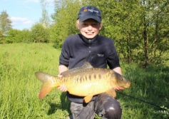 Young Hayden with a stunning 12lb mirror stalked in the margins on breadflake from Alvechurch 2 - Summer 2013.
